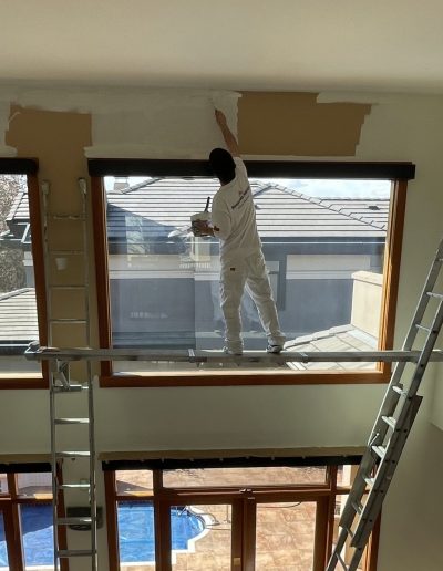 Platinum Pro Coatings Staff on plank